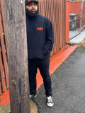 "Picked up a mic before I picked up a gun" Hoodie